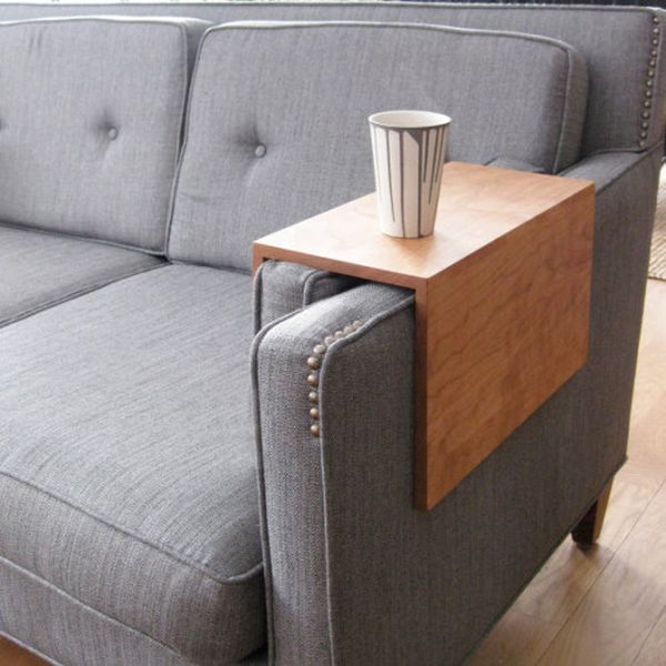 Couch arm wrap, a space saving alternative to coffee tables - HomeCrux