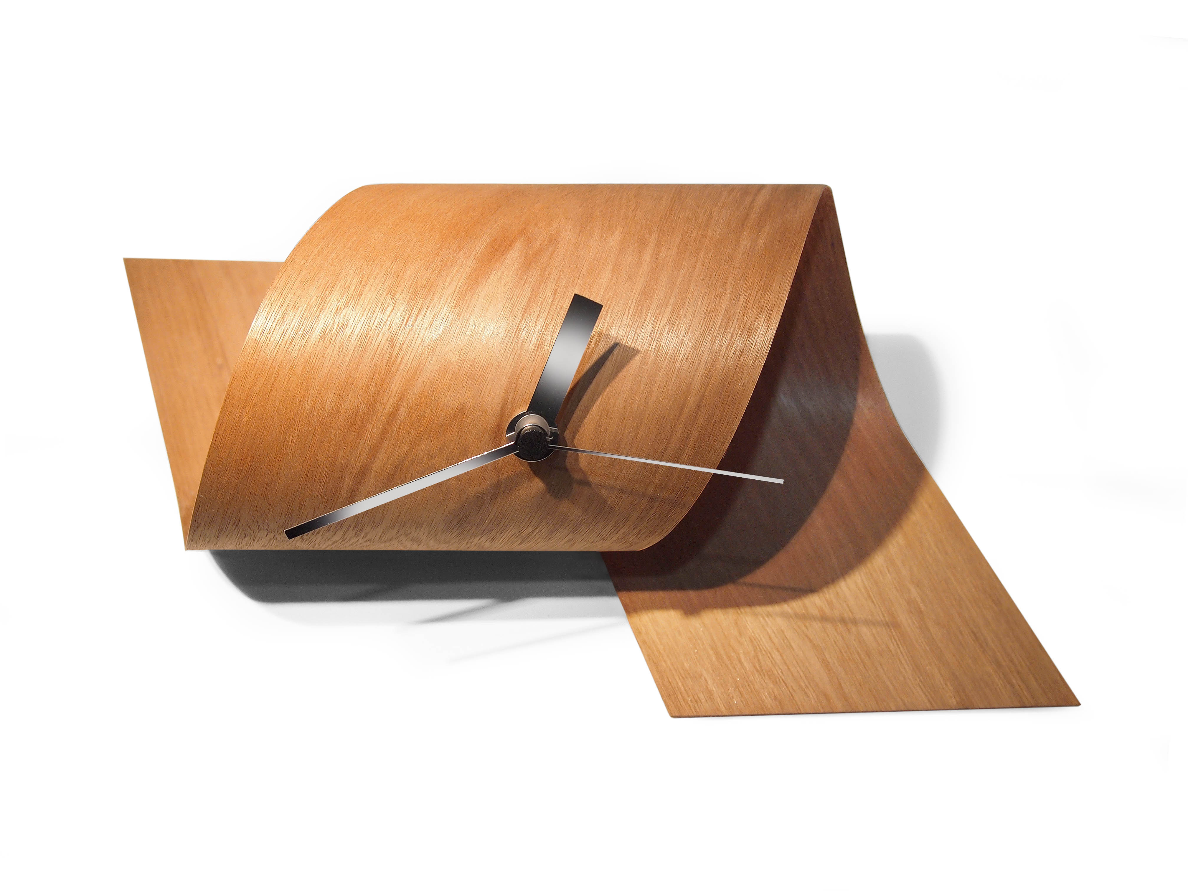 Tothora Mediterrania wooden wall clock twists to change shape
