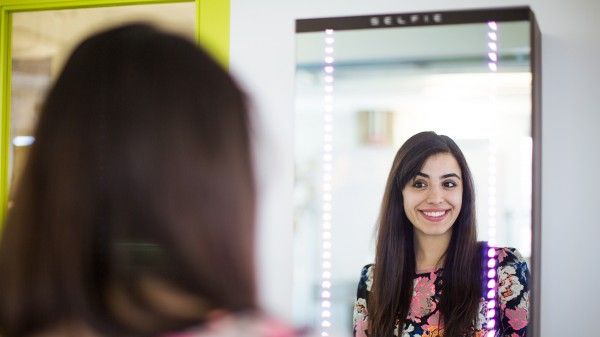 Selfie Mirror from iStrategyLabs lets you click and share selfies instantaneously