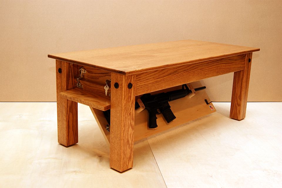Hide your weapons inside secret compartment of this Oak coffee table