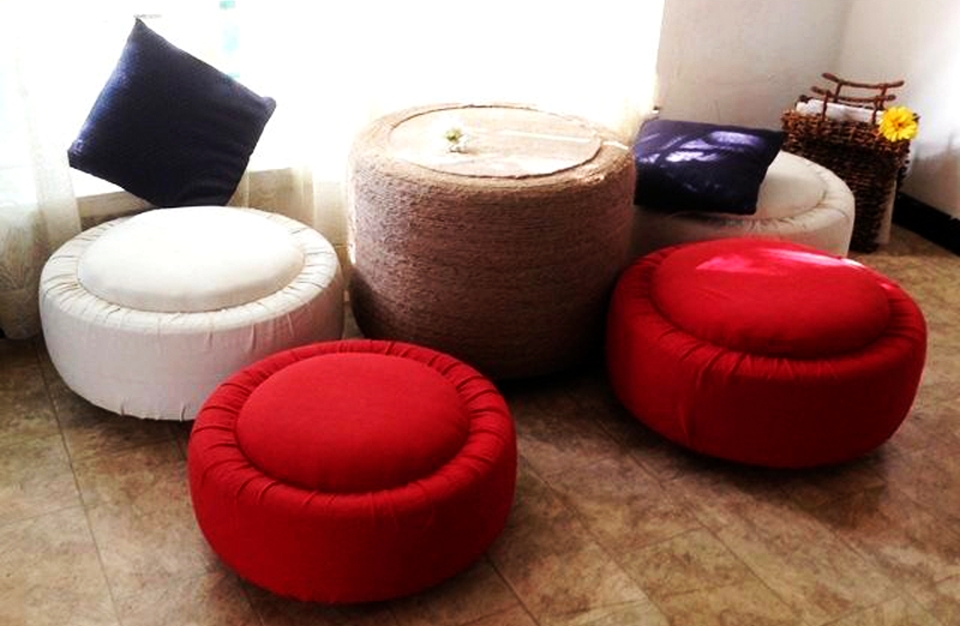 Repurpose Old Tires Into Elegant Ottoman And Coffee Table Homecrux Diy Ottoman And Coffee Table From Old Tires