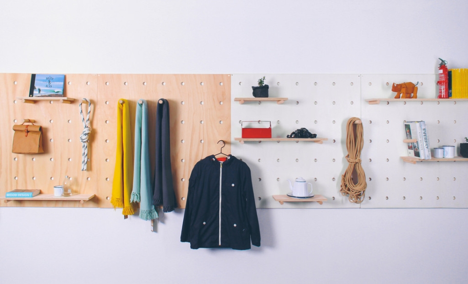 Modular Shelving Unit Uses Pegs To Support Shelves And Hang Clothes Modular Shelving Unit Uses Pegs To Support Shelves And Hang Clothes
