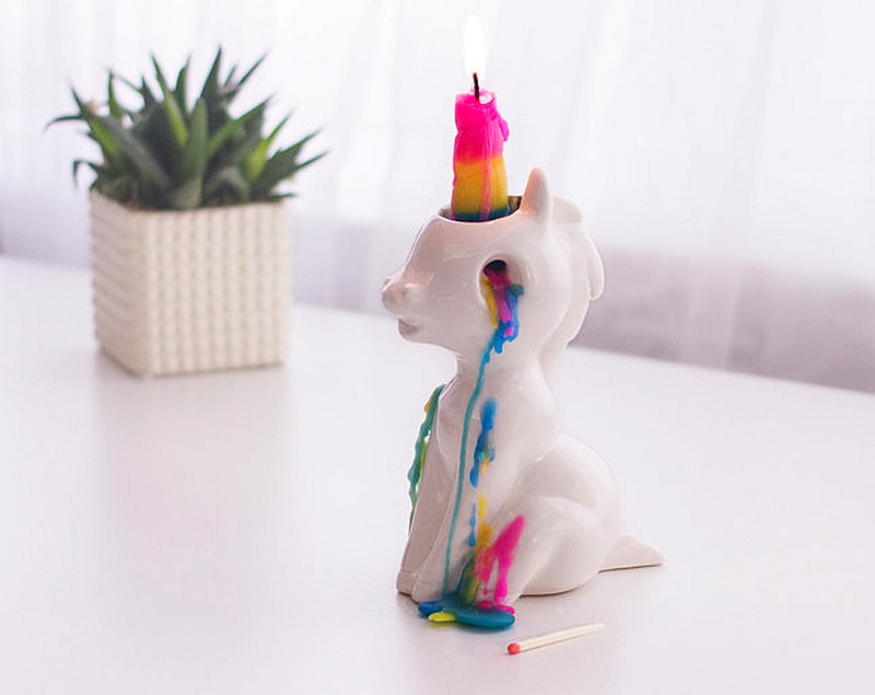 Adorable crying unicorn candle sheds rainbow tears