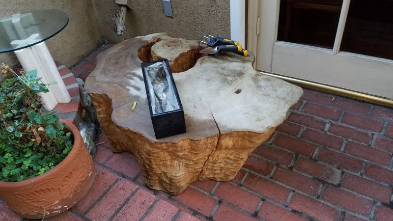 Man builds lake coffee table from a 400-year-old tree trunk