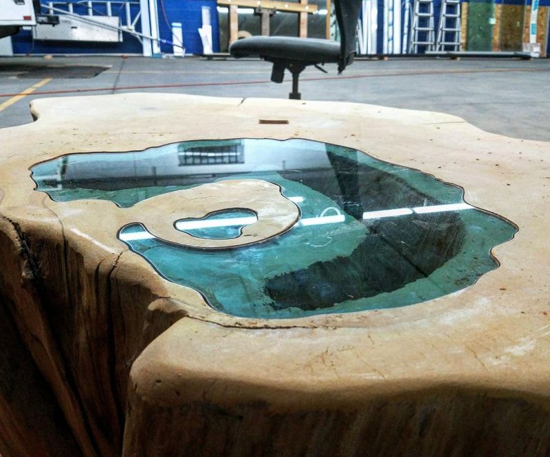lake coffee table from a 400-year-old tree trunk 23