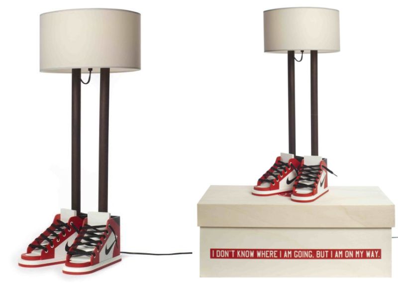 sculptural lamp with pair of bulky Jordan sneakers