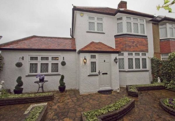 Uxbridge Road house with purple interiors