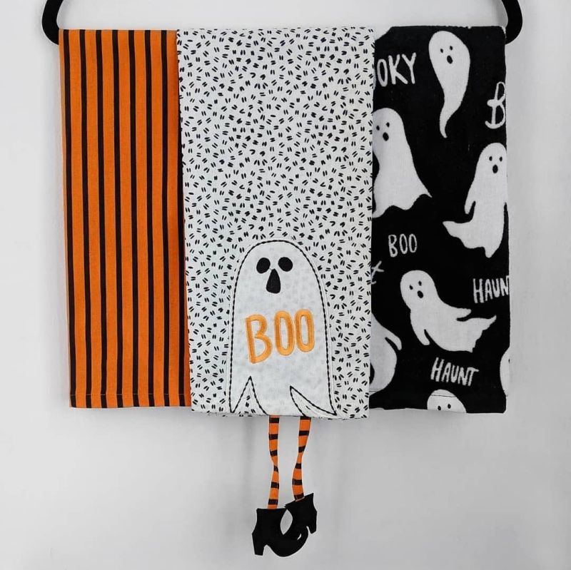 Halloween-themed curtains, towels, floor mat, etc.