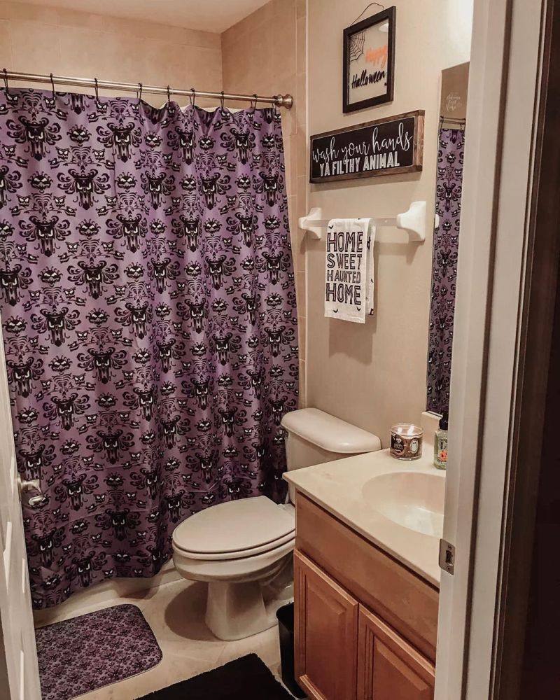 Halloween-themed curtains, towels, floor mat, etc.