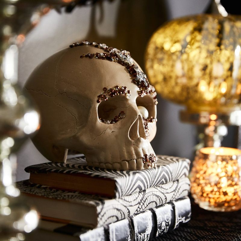 Skull, spiders, and other Halloween props are needful