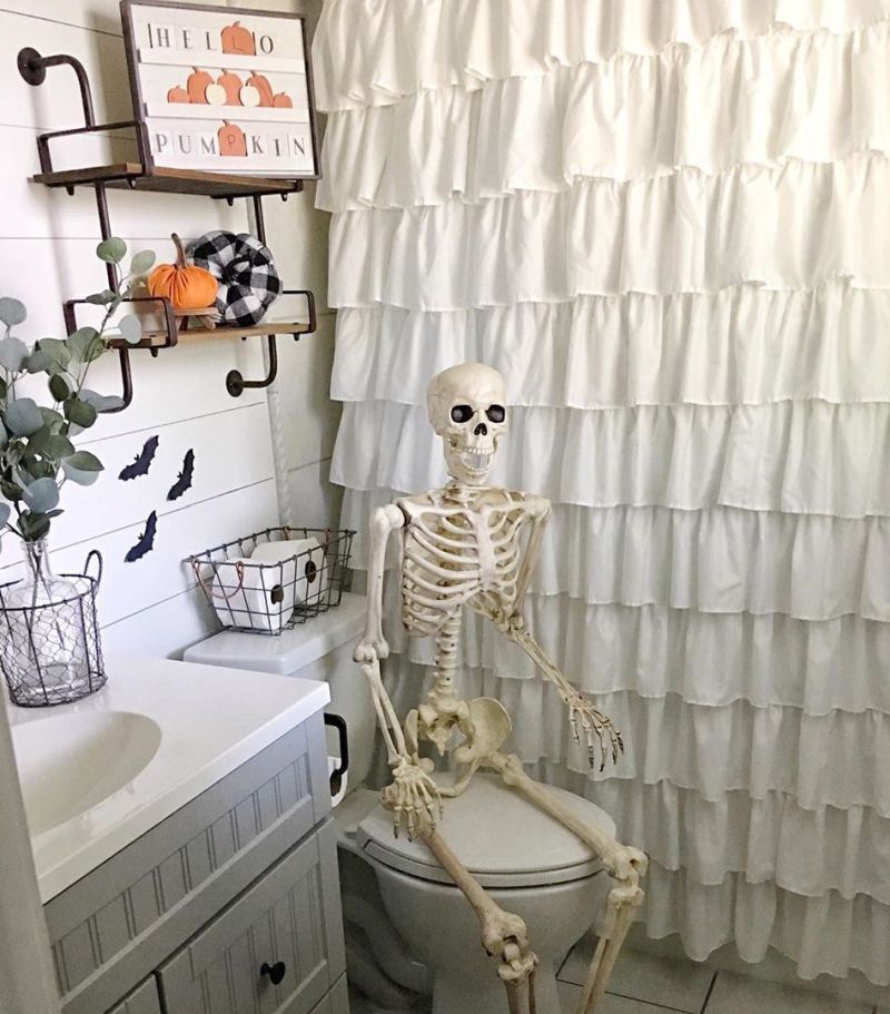 Skull and skeletons in bathroom