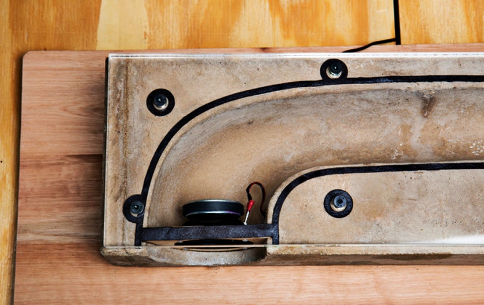 Shape of the speaker at one side is reminiscent of the indigenous African trumpet