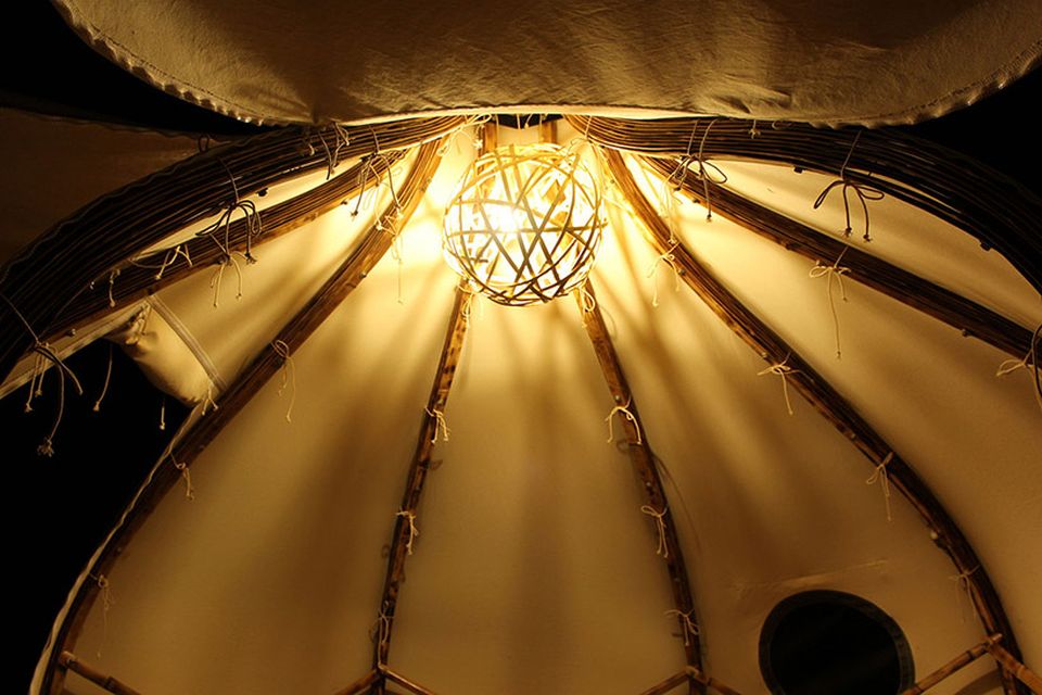 Lamp made from random congregation of bamboo strips