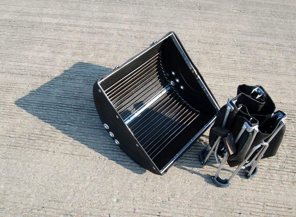 GoBQ is a fully functional charcoal grill with a lid