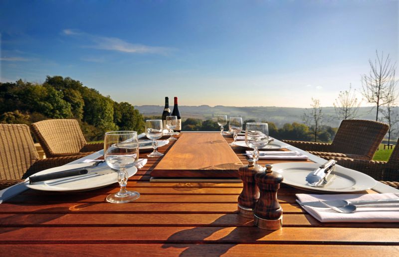 Angara Maximus outdoor dining table with built-in gas barbeque grill