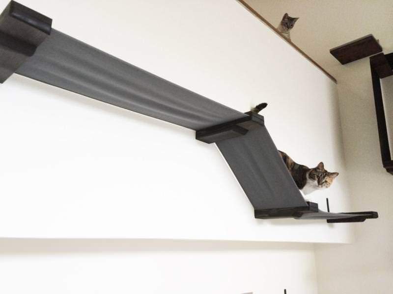 Wall-mounted bridge for playing