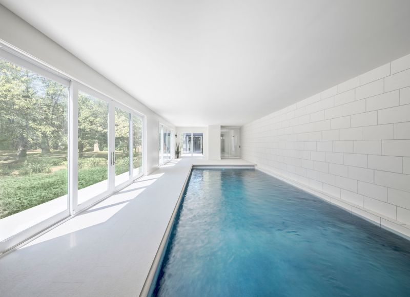 Indoor pool that opens in garden outside