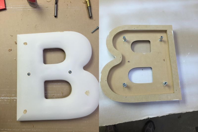 Attaching screws to the B character