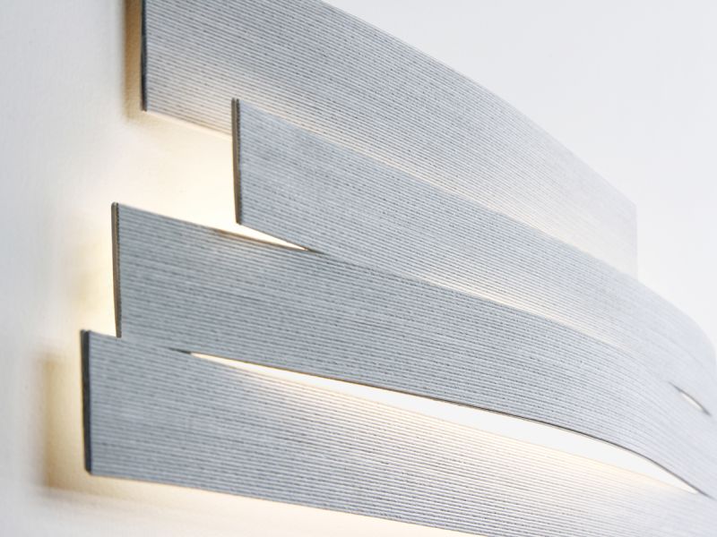 Recycled cellulose used to make these elegant wall lights