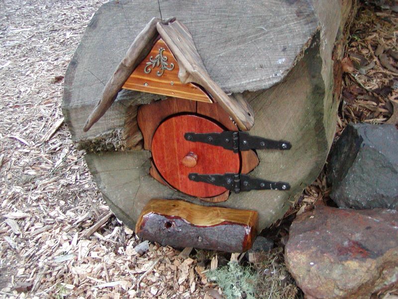 Fancy Faery Door On A Fallen Tree Makes Passage For Fairies