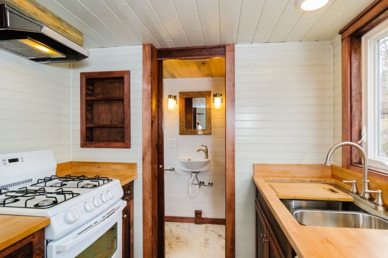Door form kitchen leads to the bathroom cum toilet