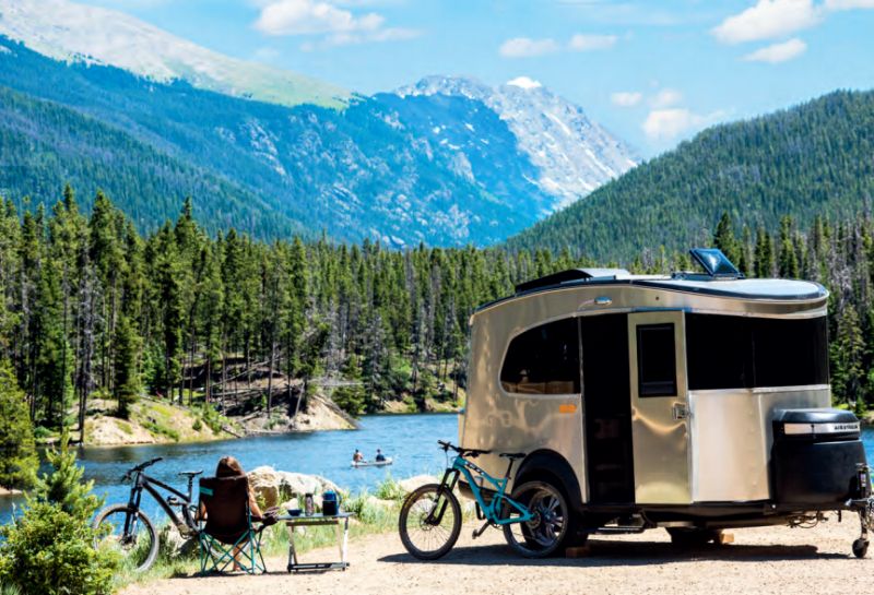 Airstream Basecamp is a shiny aluminum trailer with luxurious features
