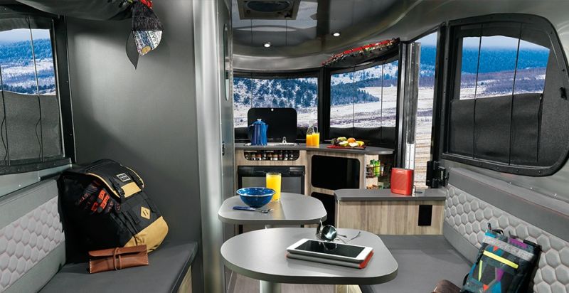 Airstream Basecamp is a shiny aluminum trailer with luxurious features