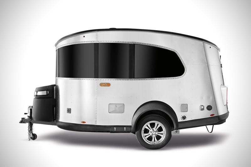 Airstream Basecamp is a shiny aluminum trailer with luxurious features