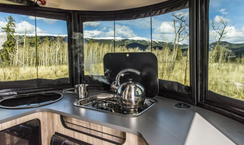 Airstream Basecamp is a shiny aluminum trailer with luxurious features