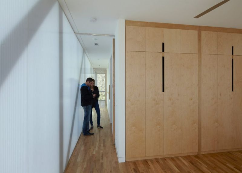 Interiors designed in white accent with wooden floor