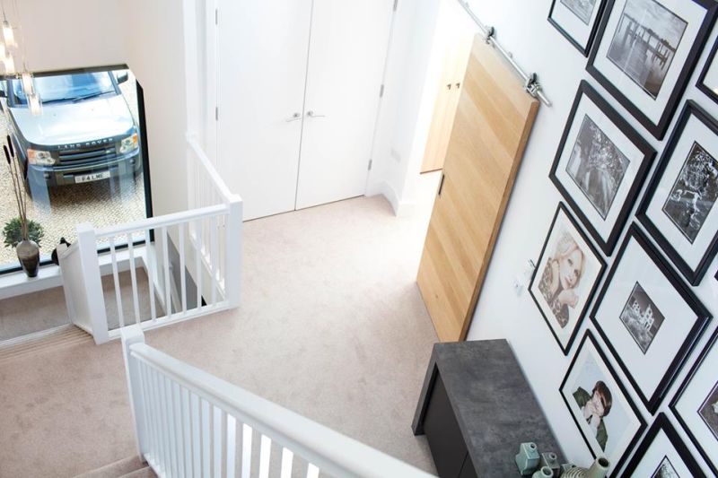 Large-pane windows and doors brings the natural light in for throughout the day