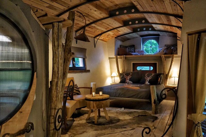 A bedroom for two persons along with proper seating space