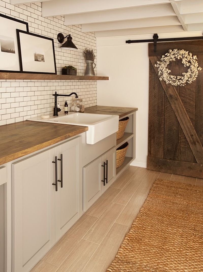 Smart use of reclaimed wood in shelving and doors to give it a rustic look