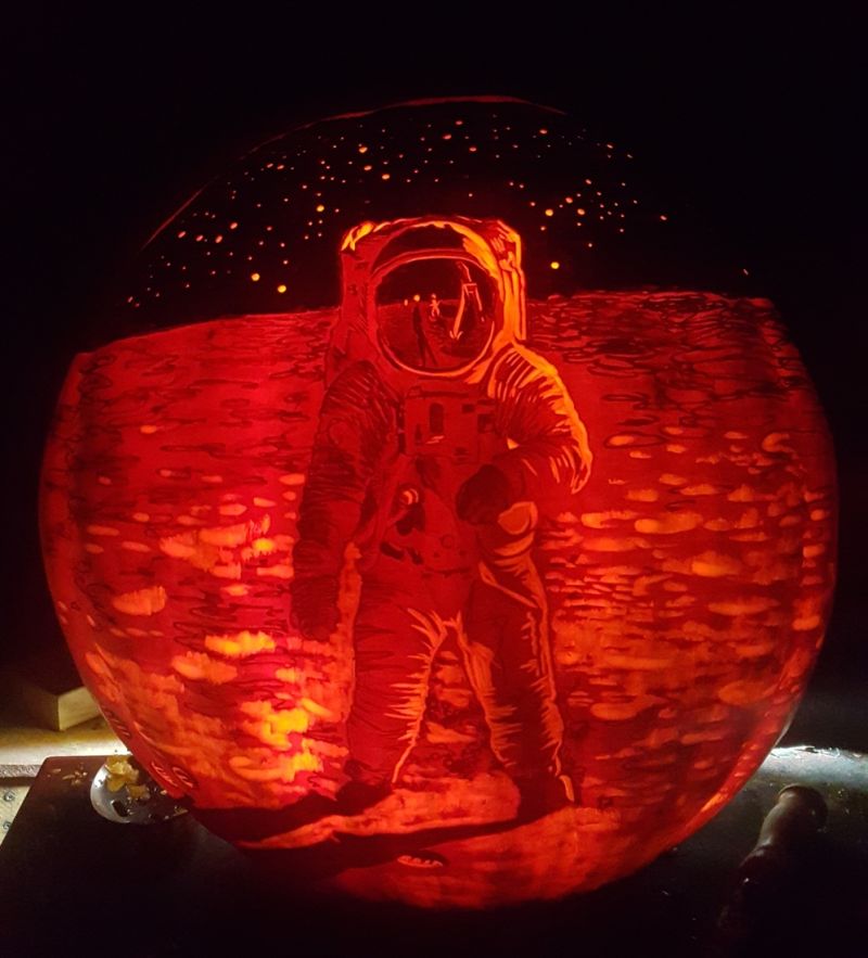 Man in moon carved on pumpkin by Edward Cabral