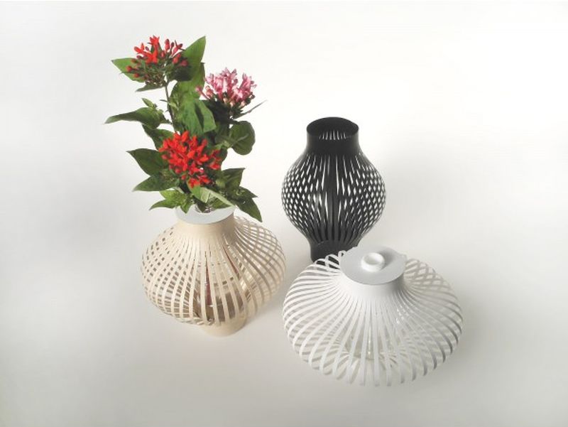 Plastic bottles reused with Kami no Tsubo paper vase