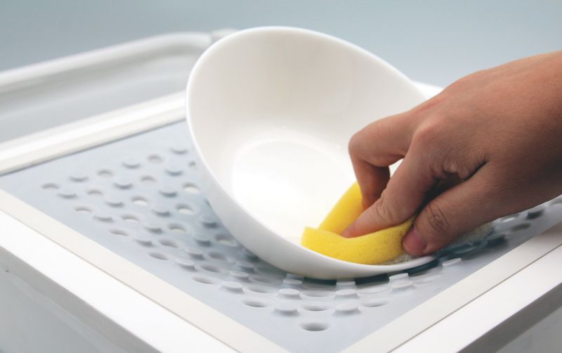 Silicone grip for keeping utensils in place