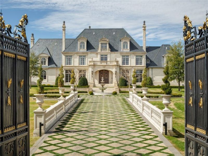 Attractive facade and lawn with tiled path