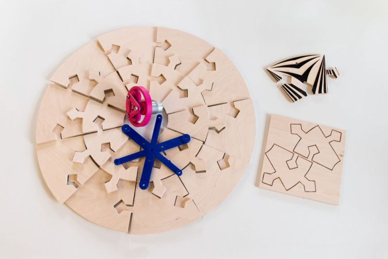 Its base is made of twenty plywood puzzles
