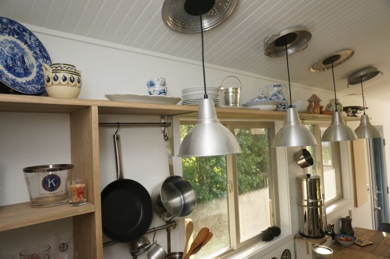 Kitchen features hanging lighting