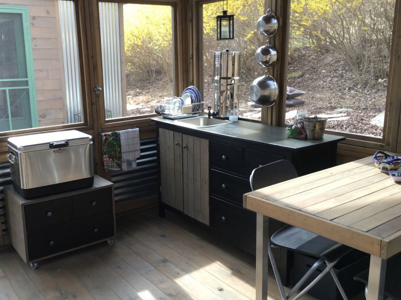 Kitchen in front of glass windows