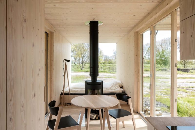 Fire place in the middle of the cabin