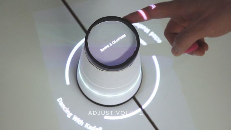 Rotate the top ring to adjust volume