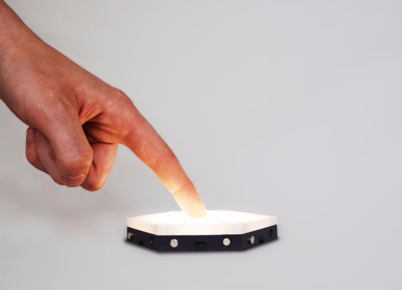 Touch-enabled lighting hexagons