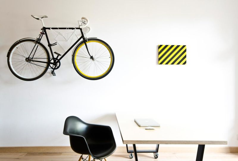 Wall mount for bicycle of the owner