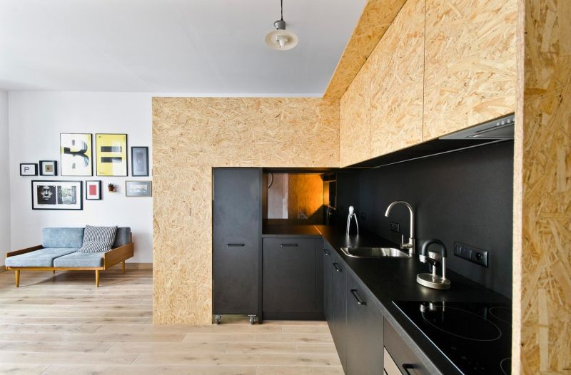 Modern kitchen space by the side of home office