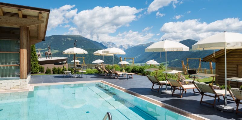 Features a series of swimming pools