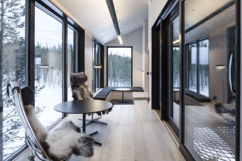 snohetta-builds-charred-timber-treehouse_7