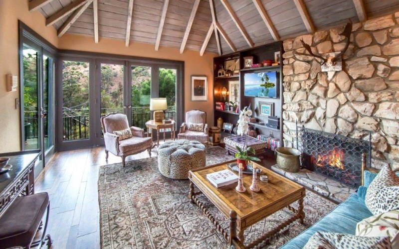 Cozy living area with elegant seating and fireplace
