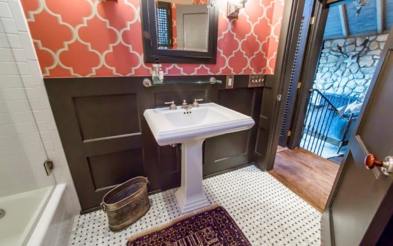 Includes a bathroom with shower space