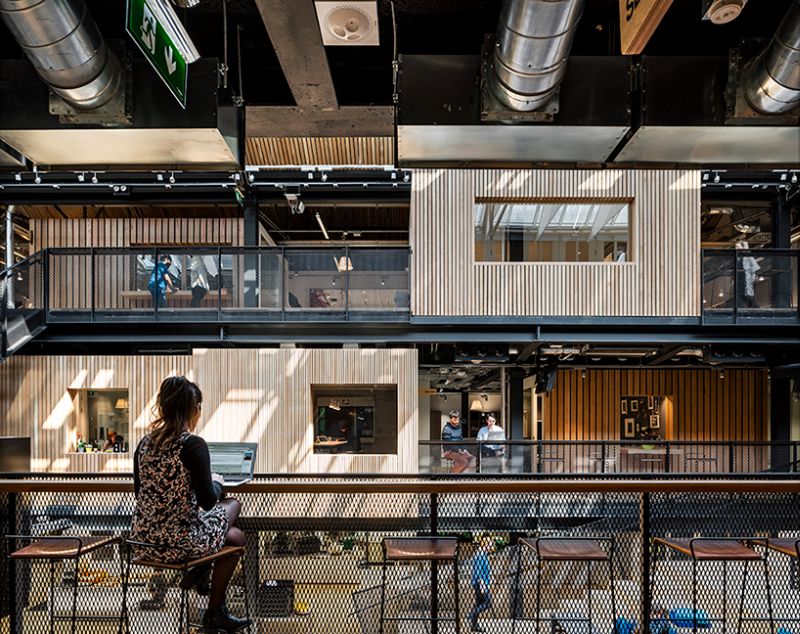 Decks with separate seating areas in first floor of the building